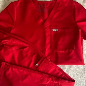 FIGS scrubs set in the color Red.